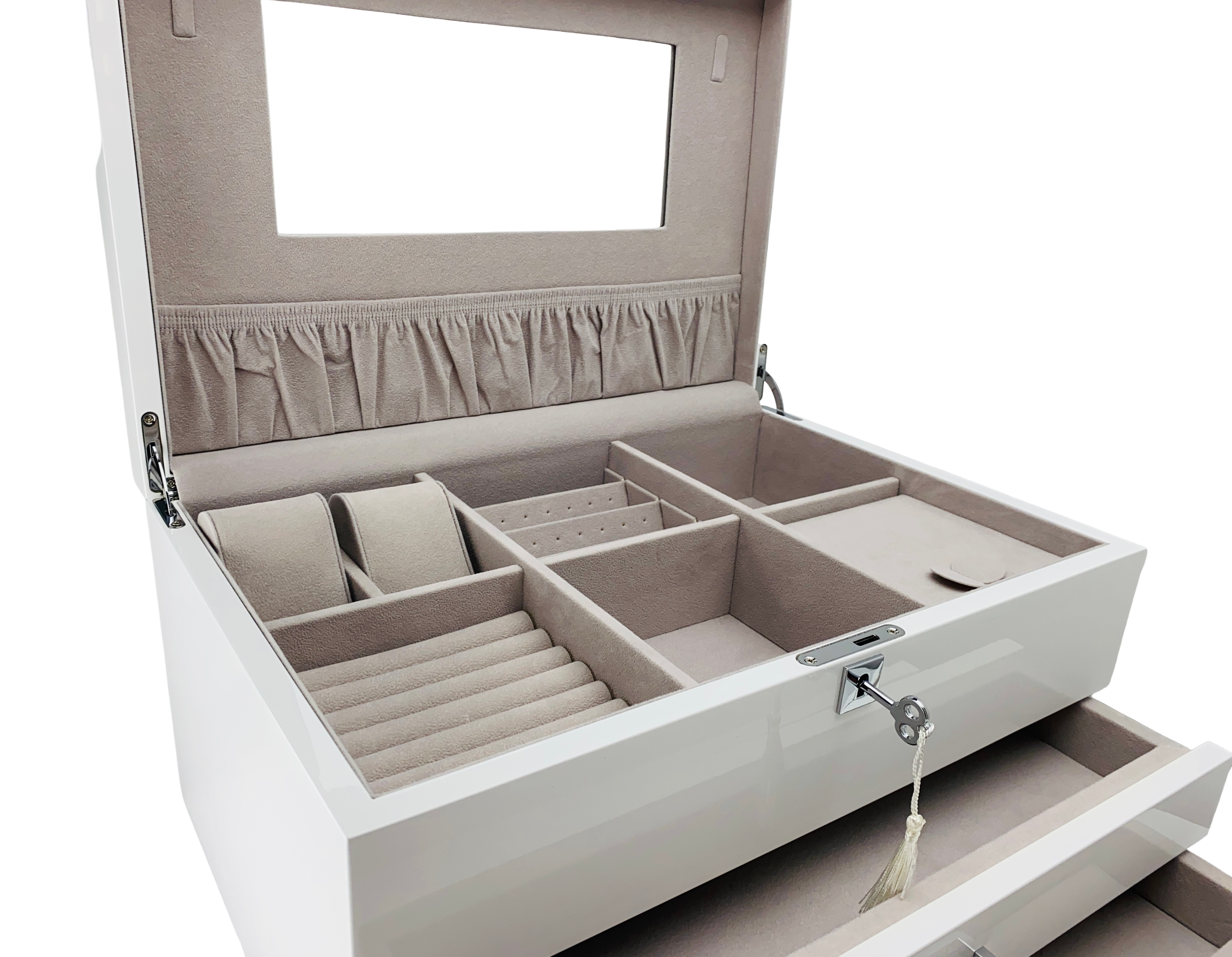 Closeup of open jewelry box with compartments on a white background